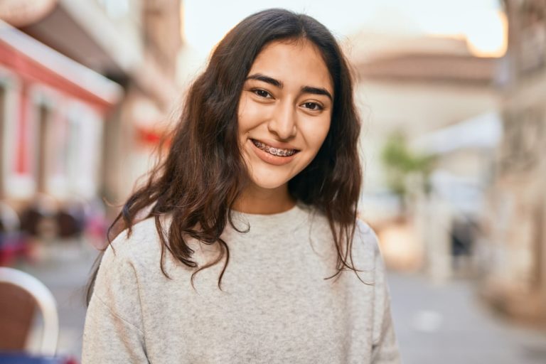 young girl with braces